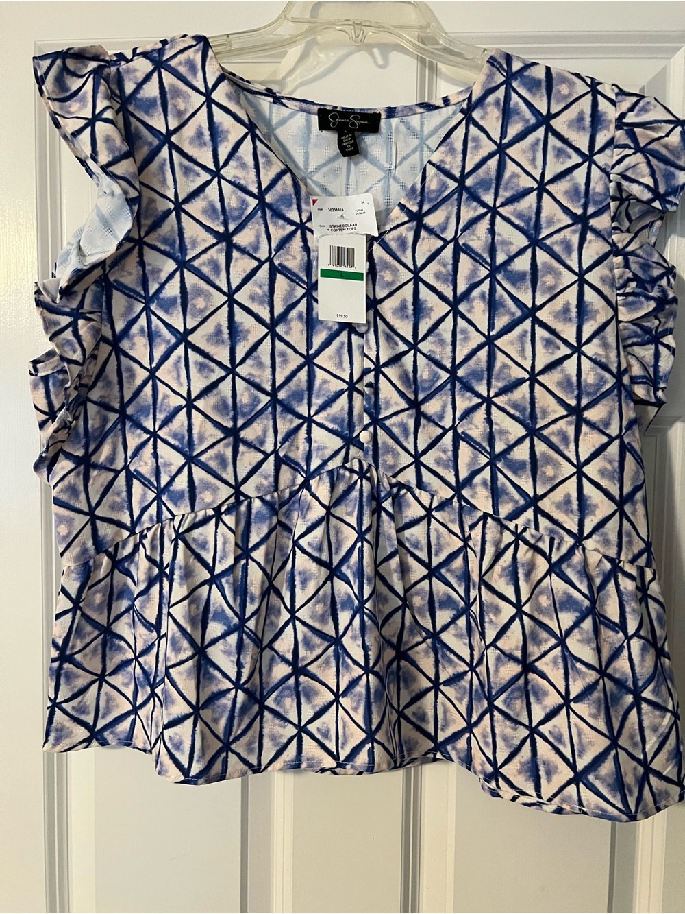 Jessica Simpson White Top with Blue Geometric Print and Ruffle Detail